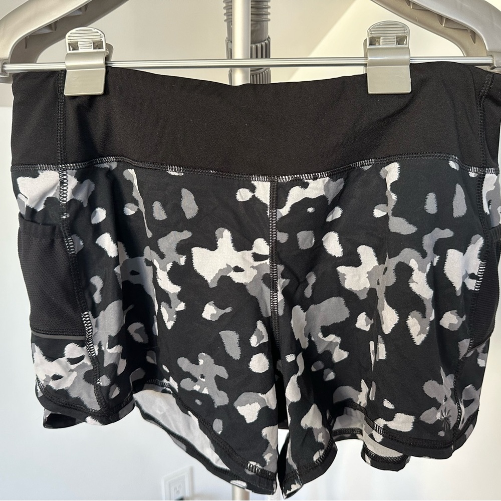 Athleta black print shorts with pocket size M
